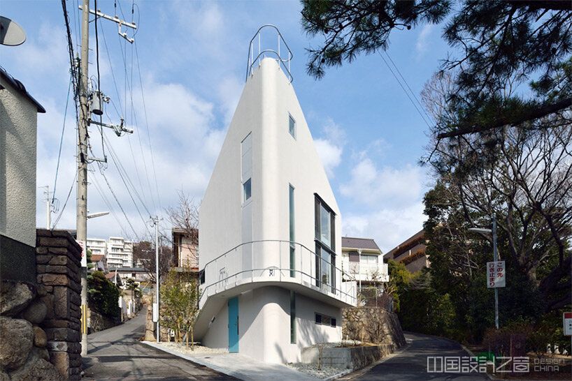 this private residence in kobe, japan, is shaped like a boat hull